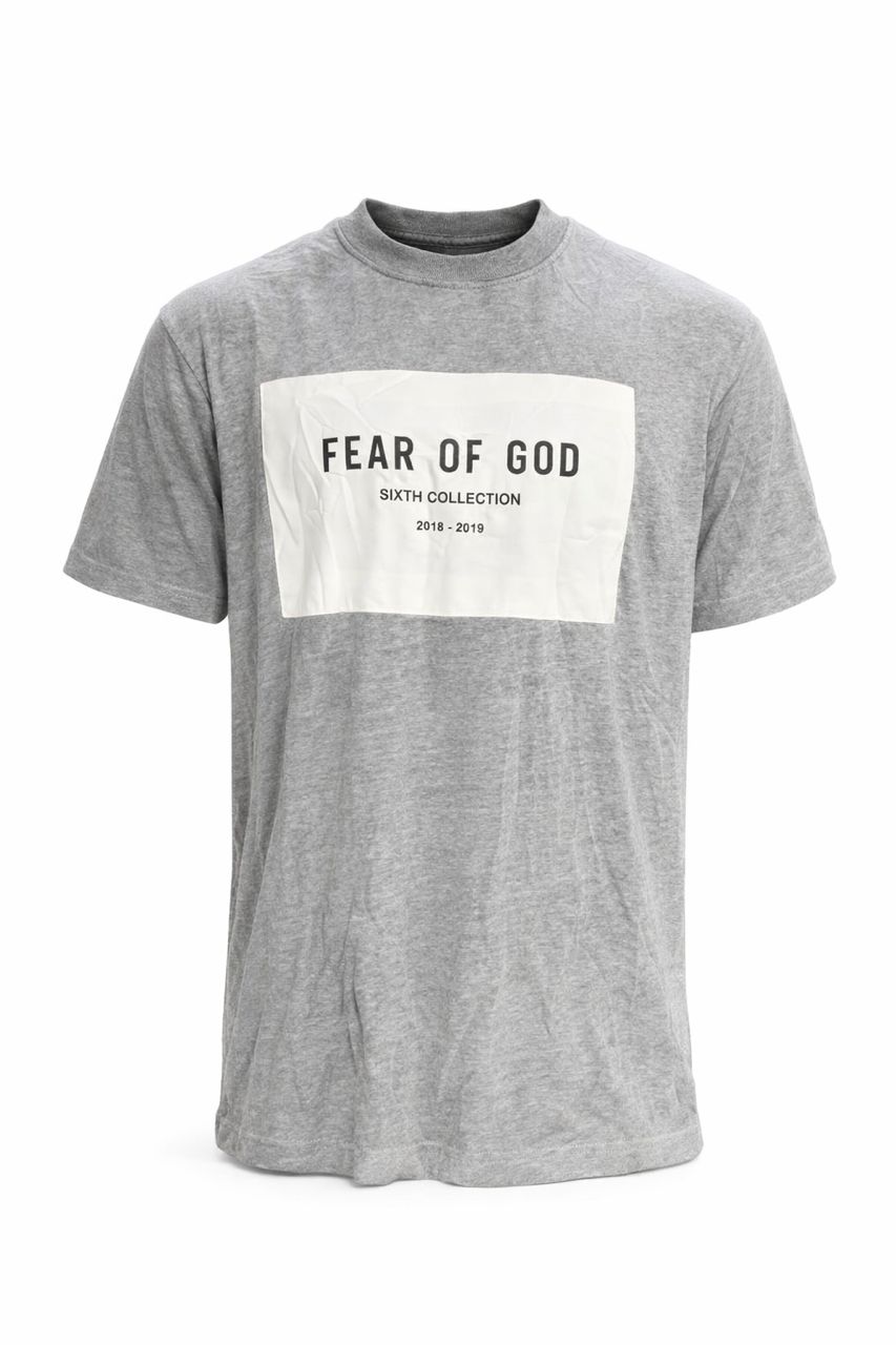 WhatsApp Image 2026-03-15 at 8.04.01 AM Fear of God Sixth Collection Heather Grey T-Shirt - Image 1