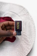 Red bucket hat featuring the Von Dutch - Image 3