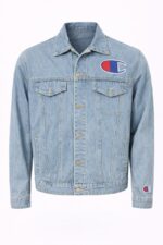light wash denim jacket featuring embroidered Champion brand logos.